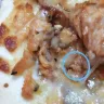 Roman's Pizza - We have examined the images sent, and can confirm that those are not fly eggs, nor what fly eggs look like.