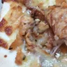 Roman's Pizza - We have examined the images sent, and can confirm that those are not fly eggs, nor what fly eggs look like.