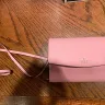 Kate Spade - I received a $150 Kate Spade purse for a gift. Used it once (I do not have receipt) and 2 of the snaps that keep the purse closed fell off. 