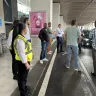 Charles de Gaulle Airport / Paris Aeroport - Taxi manager and taxi drivers at the airport taxi station 
